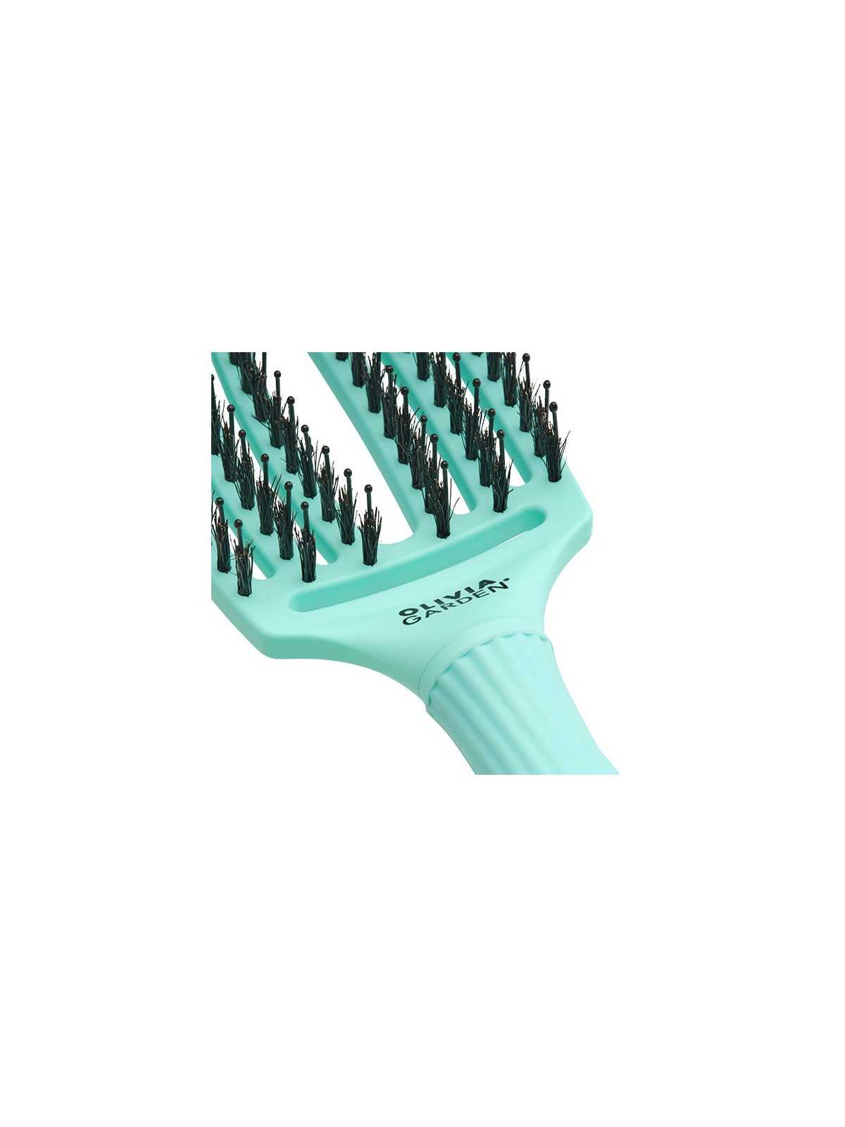 Comprar Olivia Garden Fingerbrush – Cepillo desenredante Menta Turquesa (talla M, nylon/jabalí) en Cepillos y Peines por sólo 23,50 € o un precio específico de 23,50 € en Thalie Care